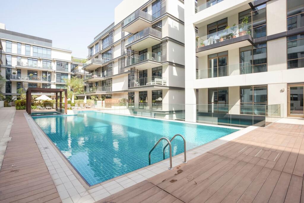 GuestReady - Captivating Apt In City Walk Pool View! - thumb 4