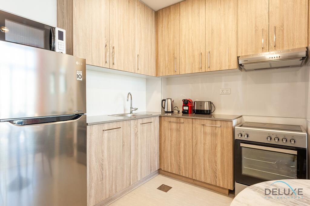 Vivid 1BR In Town Square Rawda Dubai Land By Deluxe Holiday Homes - thumb 3